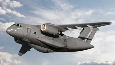 De ingang van Vliegbasis Eindhoven, af te lezen op de grote blauwe neonletters boven het gebouw. Daarnaast een vliegende C-390M.