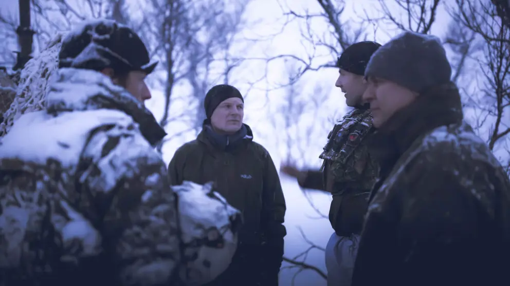 De minister en CDS in de sneeuw.