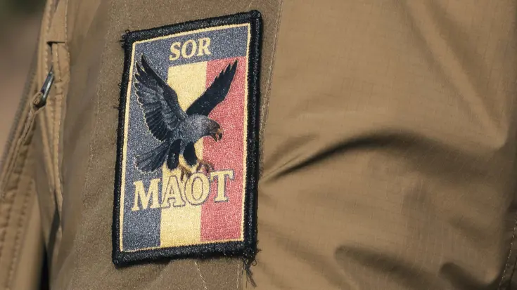 De badge van het Belgische MAOT op een mouw.