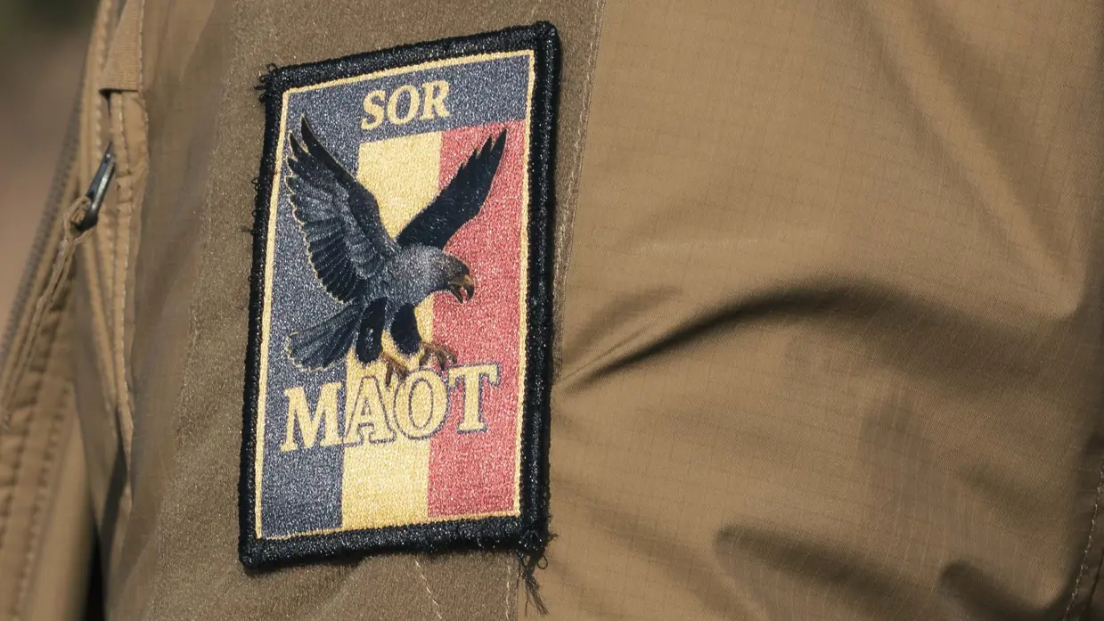 De badge van het Belgische MAOT op een mouw.