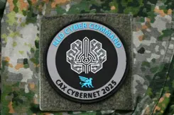 rond insigne van CAX CyberNet 2025.