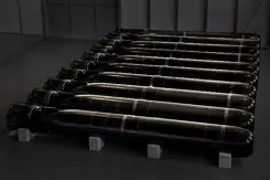 Torpedo's liggend op een rij.