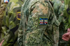 Logo van een missie op de schouder van een militair.