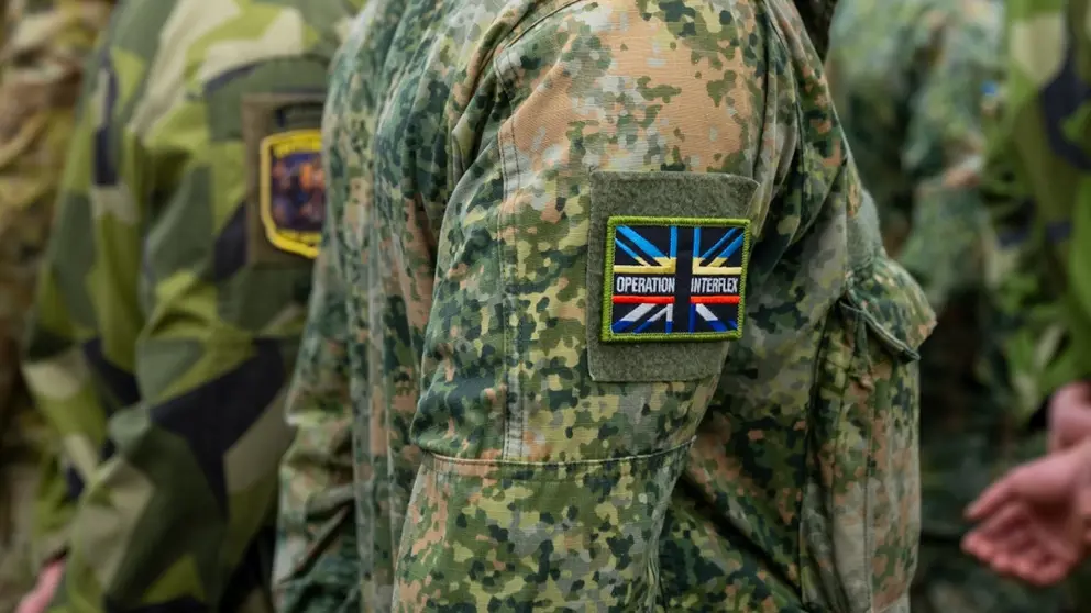 Logo van een missie op de schouder van een militair.