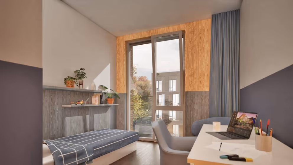 Impressie van een kamer van de nieuwe legering. Met links een bed, rechts een bureau en rechtdoor een raam.