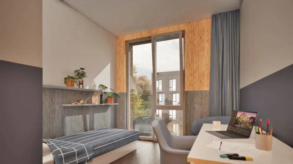 Impressie van een kamer van de nieuwe legering. Met links een bed, rechts een bureau en rechtdoor een raam.