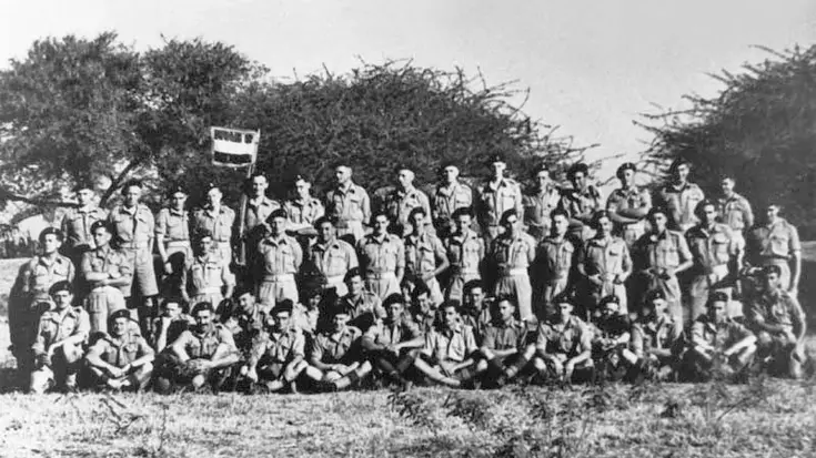 Groepsfoto van vrijwilligers bij de commandotroepen.